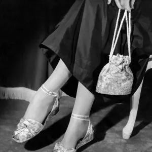 Dance sandals for Christmas parties are made in exquisite pastel brocades, and black or white Dance sandals for Christmas parties are made in exquisite pastel brocades, and black or white