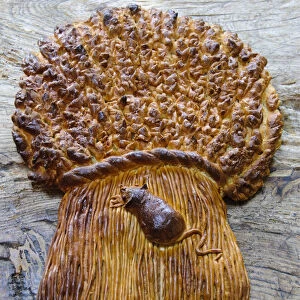 Decorative loaf in shape of sheaf of wheat with mouse for harvest festival credit