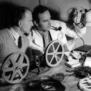 Black and white print of doctors in a cutting room Black and white print of doctors in a cutting room