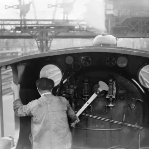 The driving cab of a typical Southern Railway Engine at Waterloo Station. 2 July 1923 The driving cab of a typical Southern Railway Engine at Waterloo Station. 2 July 1923