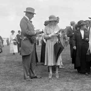 Earl of Lonsdale and Miss Audrey James at Glorious Goodwood Racecourse, West Sussex