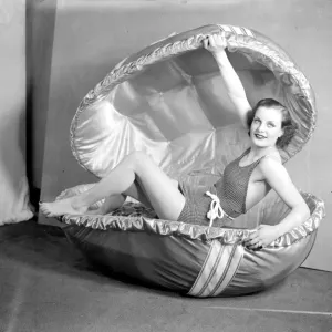 Easter, 1936. Dawn the famous Selfridge model and an outsize Easter egg. 17 March 1936 Easter, 1936. Dawn the famous Selfridge model and an outsize Easter egg. 17 March 1936