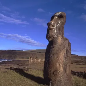 Easter Island. One of the upright giant staues near the ancient volcanic quarry Easter Island. One of the upright giant staues near the ancient volcanic quarry
