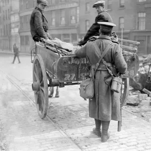 Easter Rising (originally captioned The Dublin rebellion) A sentry searching Easter Rising (originally captioned The Dublin rebellion) A sentry searching