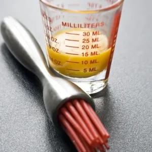Egg Yolk in Glass with Pastry Brush Print