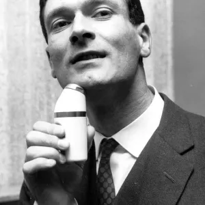 Elegant Shave Kenneth Grange of North London uses cordless electric shaver 22 May 1963 Elegant Shave Kenneth Grange of North London uses cordless electric shaver 22 May 1963