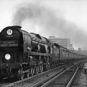 Print of a steam engine hauling the Atlantic Coast Express through Surbiton