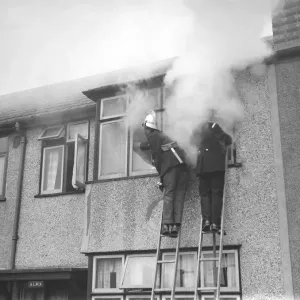 Firemen tend to a fire at Alma house on Old Farm Avenue in Sidcup, Kent Firemen tend to a fire at Alma house on Old Farm Avenue in Sidcup, Kent