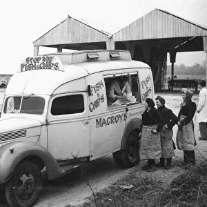 Fish and Chips for women farm workers on a chilly March day 1948. The van is a converted