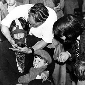 Fitting gas masks to children at Lambeth Town Hall 1939 History of London - Vauxhall