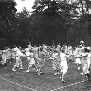 Folk dancing in Orpington, Kent. 1934 dance / dancing / party season / celebration Folk dancing in Orpington, Kent. 1934 dance / dancing / party season / celebration