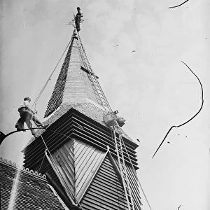 Footscray Church steeple being re - shingled. 1939