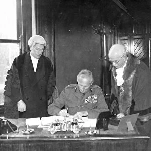 Freedom of Hastings for Montgomery. Viscount Montgomery of Alamein signing the visitors