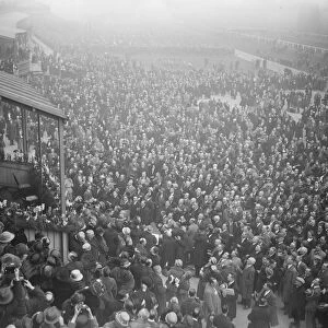 The Grand National at Liverpool. The crowd cheering the King and the Prince of