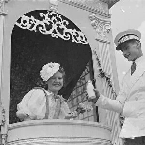 The Gravesend Carnival procession in Kent. The milkman and the maid