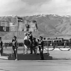 H. M. Queen Elizabeth II and the Shah of Persia take the salute at the official welcoming H. M. Queen Elizabeth II and the Shah of Persia take the salute at the official welcoming