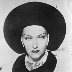 The Halo hat worn by Gloria Swanson, the American filmstar. 20 October 1934