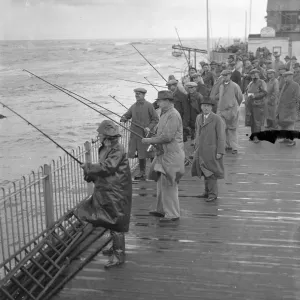 Hastings angling festival opens in a gale. With a stiff gale whipping up the sea Hastings angling festival opens in a gale. With a stiff gale whipping up the sea