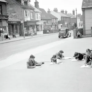 The High Street is their classroom. At least, for the morning this picture was taken. It shows pupils of the Boy's Country Secondary School of Edenbridge, Kent, on one of their regular art classes on location'. 25 May 1955 The High Street is their classroom. At least, for the morning this picture was taken. It shows pupils of the Boy's Country Secondary School of Edenbridge, Kent, on one of their regular art classes on location'. 25 May 1955