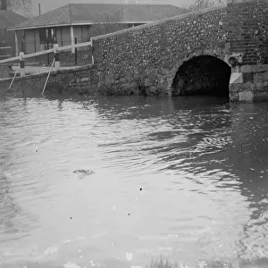 High water at the bridge crossing the River Darent at Shoreham, Kent