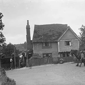 Horse and haycart make their way down Sparepenny Lane, Tollgate, Eynsford, Kent