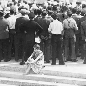 The hot weather proved too much for this woman spectator at the Oval this morning