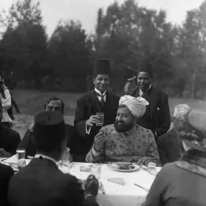 The Imam eating during the Feast of Sacrifice in the gardens of the Mosque in Woking, Surrey The Imam eating during the Feast of Sacrifice in the gardens of the Mosque in Woking, Surrey