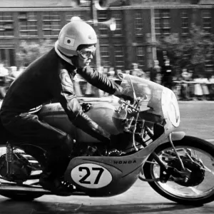 Isle of Man: One of the Japanese team members T Tanaka speeds round thes maller Clypse Isle of Man: One of the Japanese team members T Tanaka speeds round thes maller Clypse
