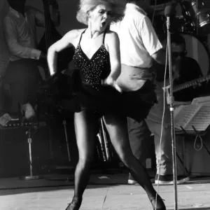 Joey Heatherton performs a dance for American servicemen in South Vietnam, January 1967 Print Joey Heatherton performs a dance for American servicemen in South Vietnam, January 1967 Print