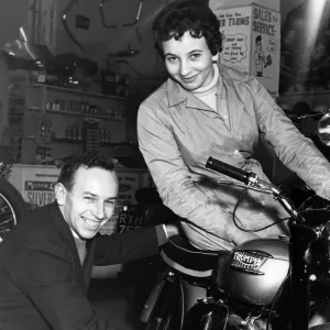 John and Dorothy Surtees in their family motorcycle shop 1950s