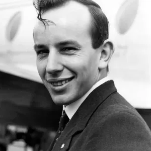 John Surtees, Briatins ace motor-cyclist, seen before he left London Airport for Milan