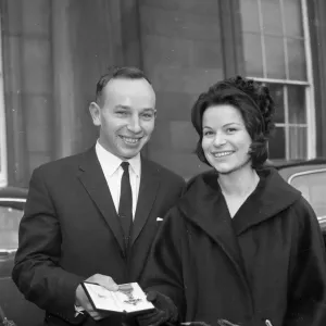John Surtees with Miss Patricia Burke outside Buckingham Palace Print