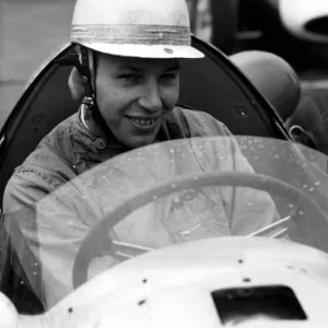 John Surtees world champion motor cyclist who has taken up motor car racing