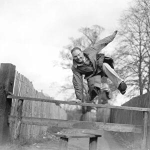 John Topham jumping a style 1936 A John Topham / TopFoto