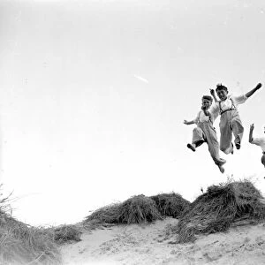 Jumping for joy at Camber Sands in Sussex. 1934