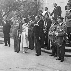 King Zog take salute in peasants celebration parade in Tirana. King Zog I, accompanied