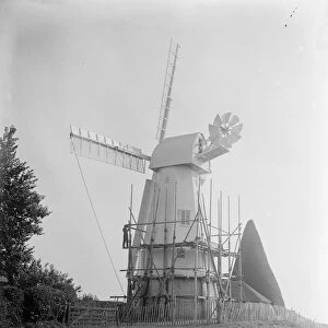 Well known landmark restored. The rebuilding of the smock windmill in the grounds