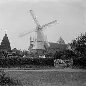 Well known landmark restored. The rebuilding of the smock windmill in the grounds