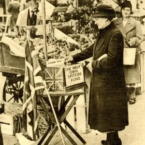 Print of a Spitfire on Lambeth Walk, London