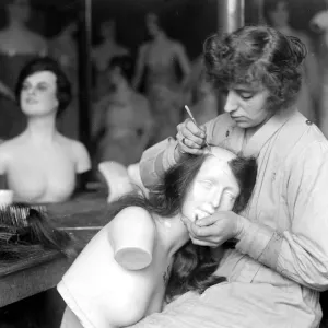 The making of wax models at Sages, Grays Inn Road. Attaching silken tresses to the scalp The making of wax models at Sages, Grays Inn Road. Attaching silken tresses to the scalp