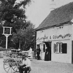 A man with a small cart outside public house at Eversley 1906 A man with a small cart outside public house at Eversley 1906