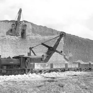 Mechanical excavators loading chalk directly onto railway trucks for the short run