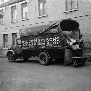 Men Unloading Bones Print, 1937 Men Unloading Bones Print, 1937