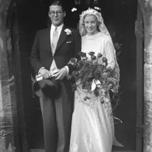 The Miles and Crabb wedding at Orpington, Kent. The bride and groom as they leave the church The Miles and Crabb wedding at Orpington, Kent. The bride and groom as they leave the church