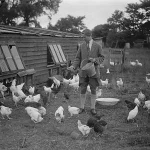 Miss Foster winner of Kings prize at Bisley at home of her chicken farm. 21 July 1930 Miss Foster winner of Kings prize at Bisley at home of her chicken farm. 21 July 1930