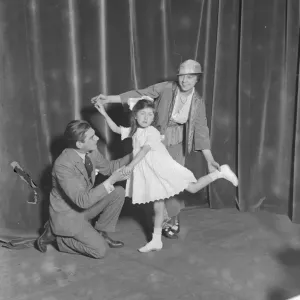 Miss Teddie Gerrard and Mr Harry Pilcer teaching Gwennie Seabrook to dance dance Miss Teddie Gerrard and Mr Harry Pilcer teaching Gwennie Seabrook to dance dance