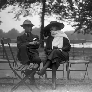 Mme Peletier with her husband sitting in Hyde Park, London. She is an English Mme Peletier with her husband sitting in Hyde Park, London. She is an English