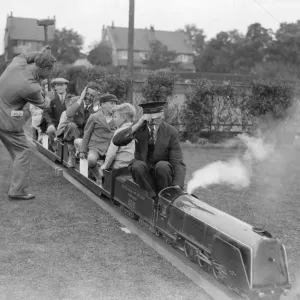 This model train was an attraction at the S. R. Gardeners Show at the sports ground Plough Lane This model train was an attraction at the S. R. Gardeners Show at the sports ground Plough Lane