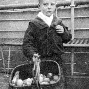 Print of a St Kilda boy selling sea-bird eggs, 6 September 1930