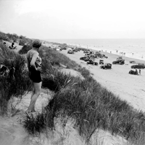Motor cars on Camber Sands, Sussex. 1933